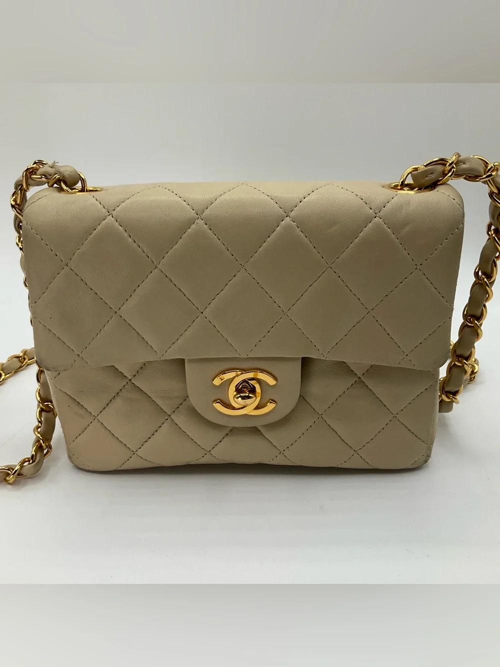 Chanel Classic Mini Flap Beige Quilted Lambskin Leather Gold Chain Shoulder Bag